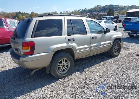 2004 Jeep Grand Cherokee Laredo z USA, uszkodzony, nr VIN 1J4GW48S64C214774